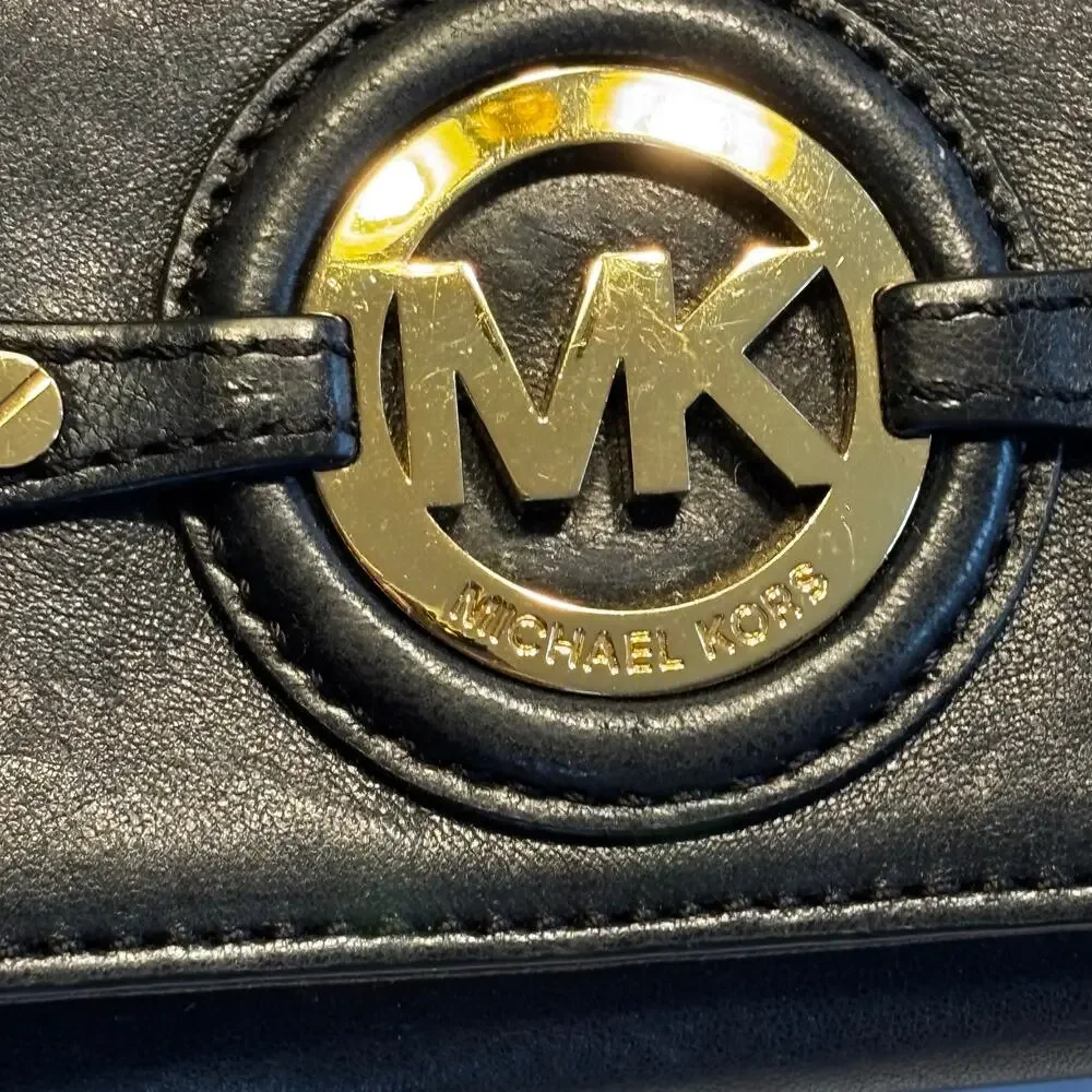 Michael Kors buttery soft black leather wallet gold logo medallion accordion
